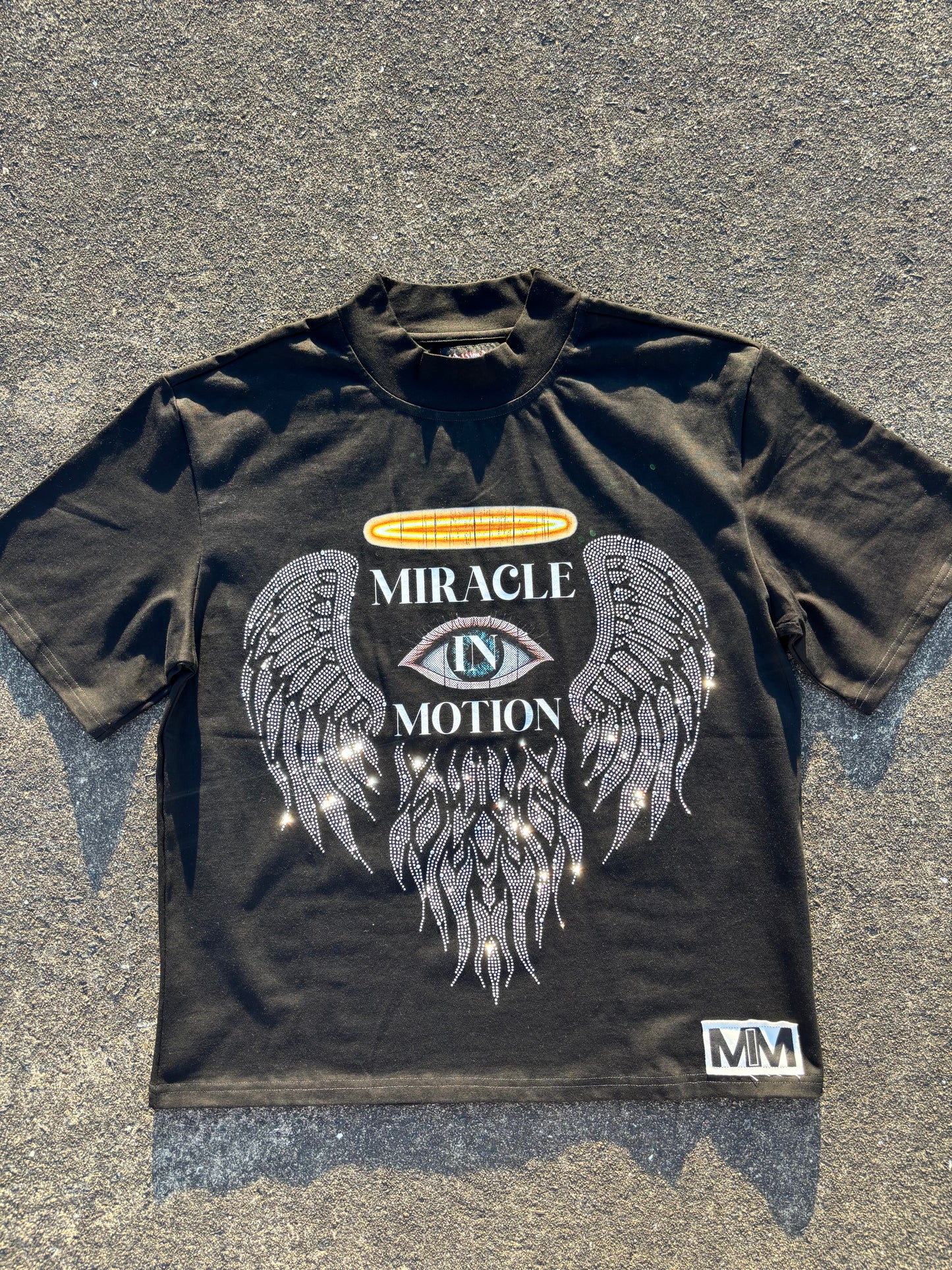 MIRACLE IN MOTION Signature Tee (Black/Oversized)
