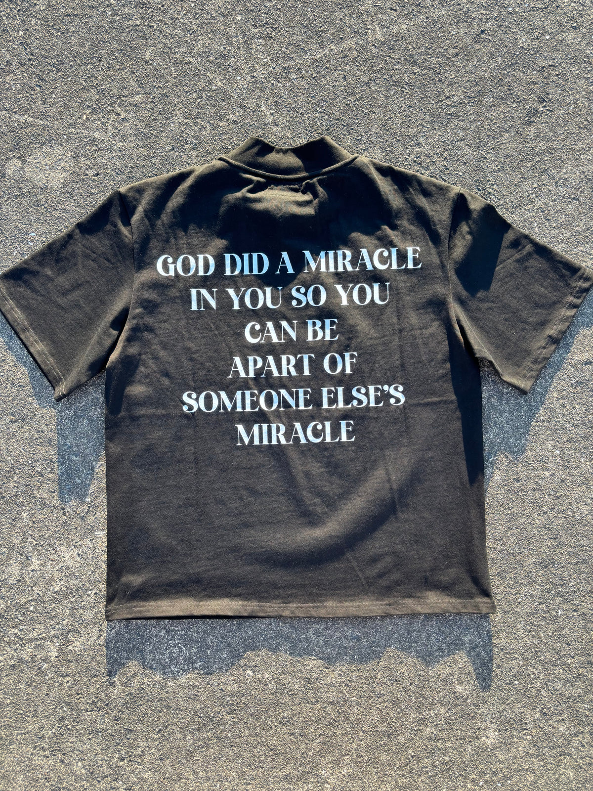 MIRACLE IN MOTION Signature Tee (Black/Oversized)